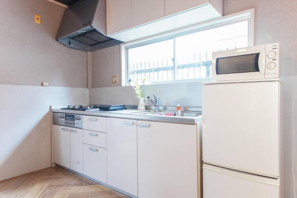 Sanacion Namba 難波千日前の5Ldk120平米 駅徒歩2分 広々バルコニーでバーベキューも可能 Apartamento Osaca Exterior foto