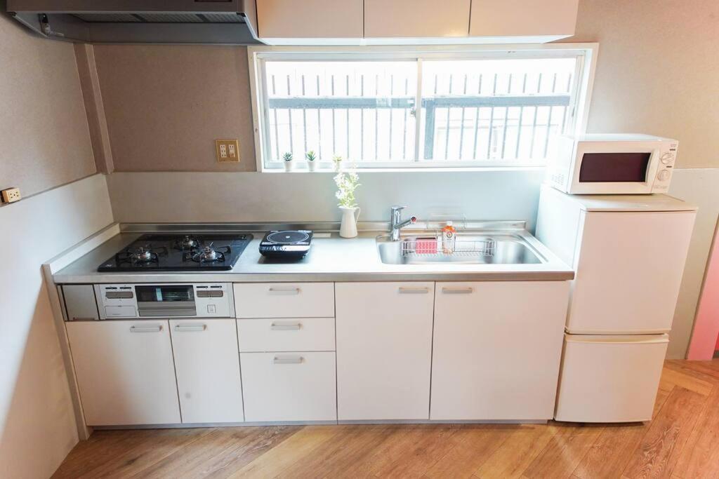 Sanacion Namba 難波千日前の5Ldk120平米 駅徒歩2分 広々バルコニーでバーベキューも可能 Apartamento Osaca Exterior foto